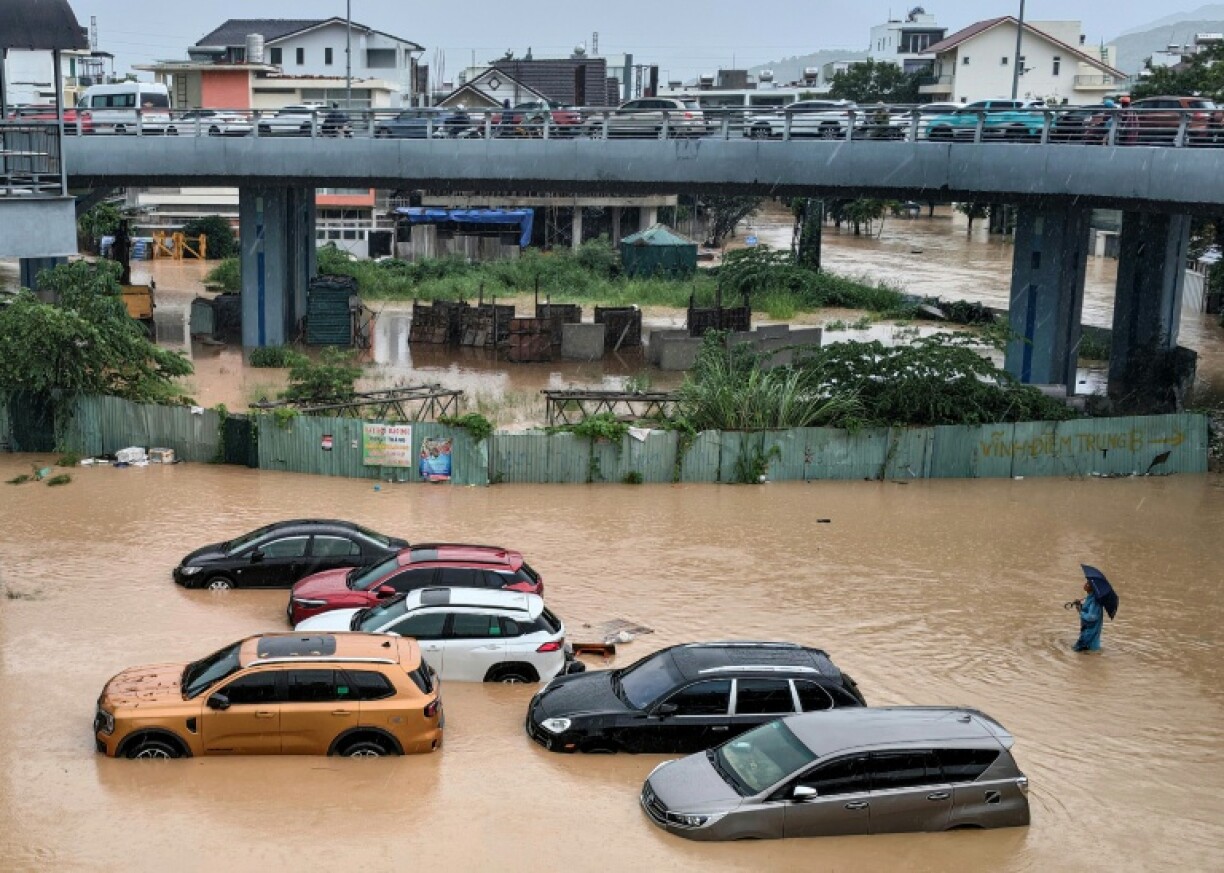 In coastal Nha Trang, whole city blocks were inundated and hundreds of cars were underwater