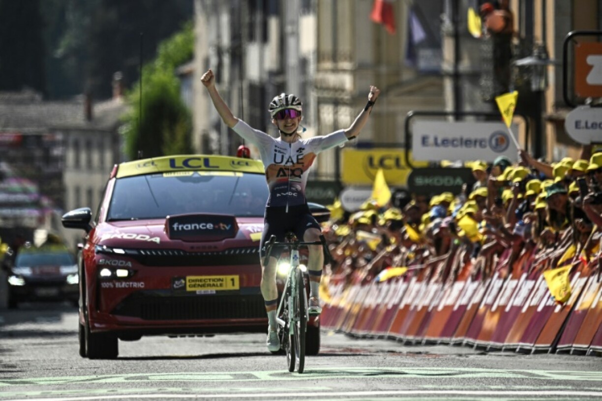 Maeva Squiban celebrates as she wheels towards the finish line at Ambert