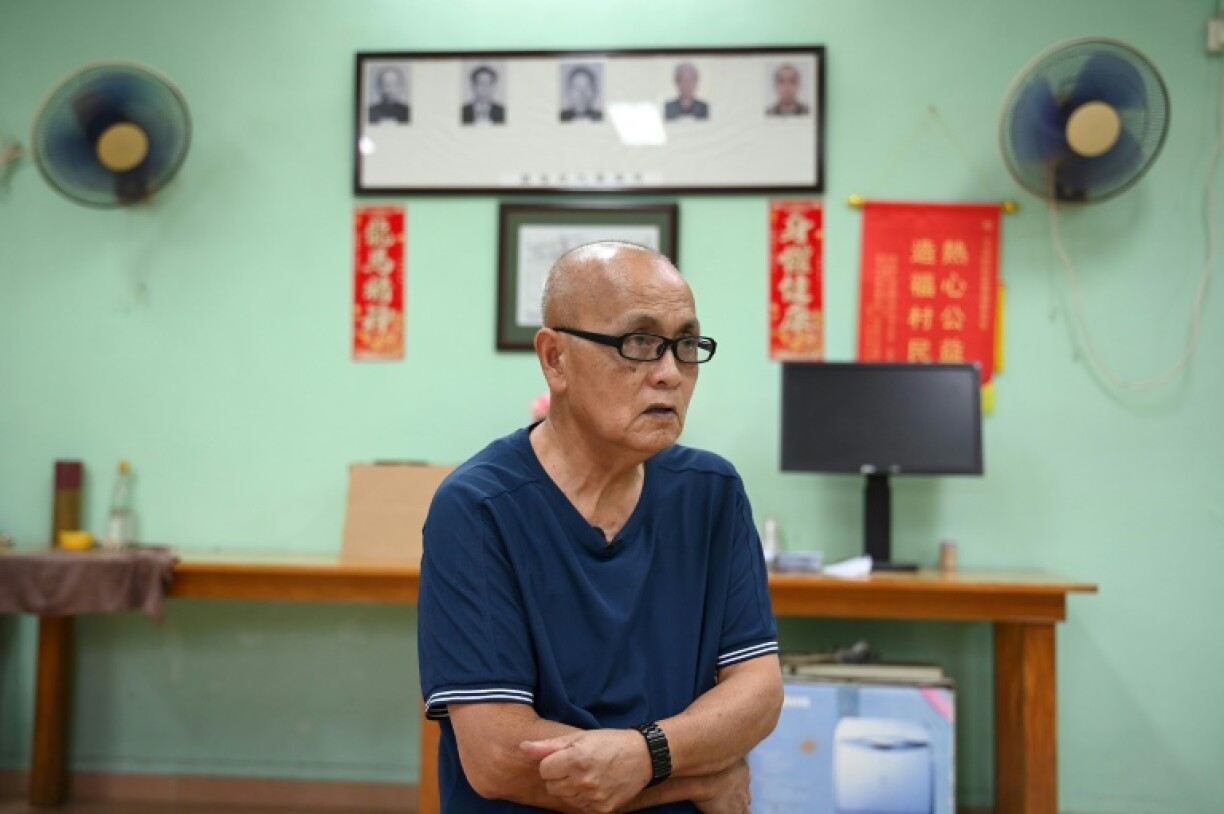 Kwok Hoi-yin, elected chief of the hundred-year-old Hong Kong village Ha Wan Tsuen, talks to AFP on the border with the Chinese city of Shenzhen