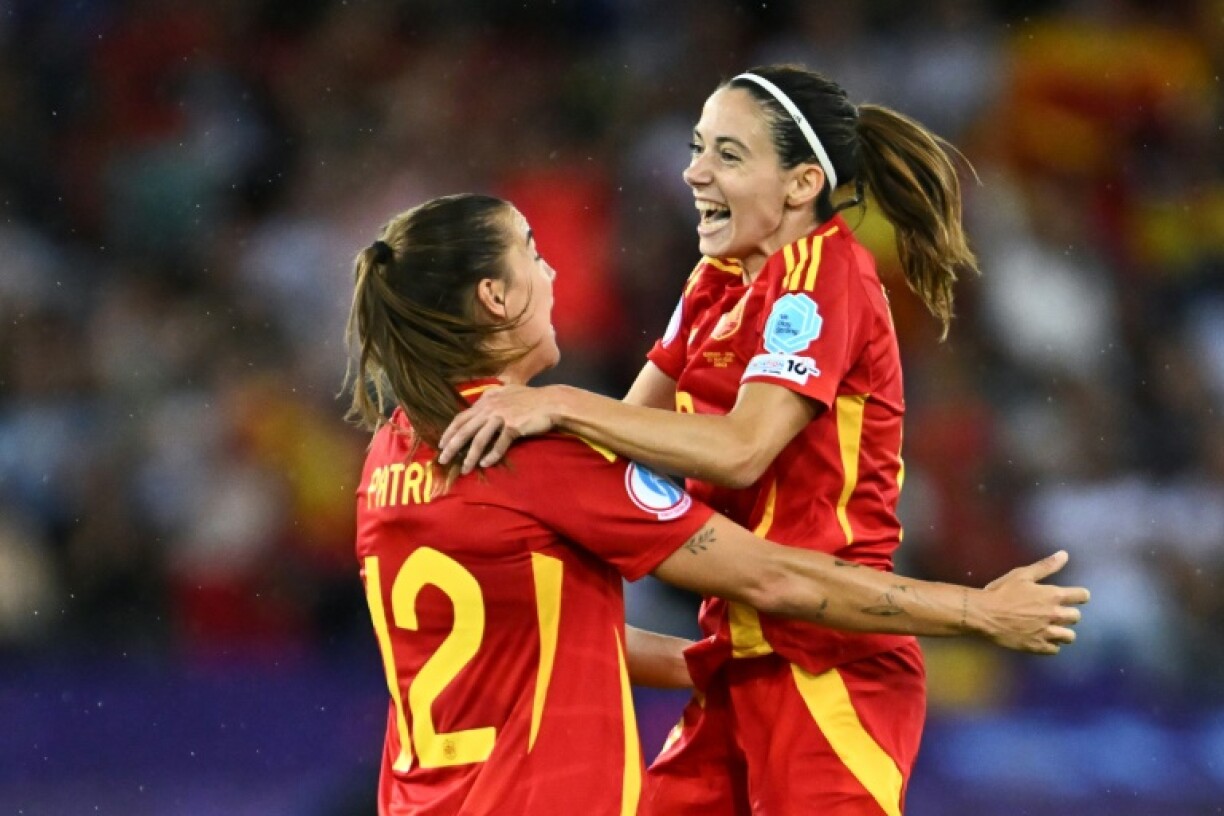Aitana Bonmati (R) celebrates with teammate Patri Guijarro at full-time in Spain's Euro 2025 semi-final win over Germany on Wednesday
