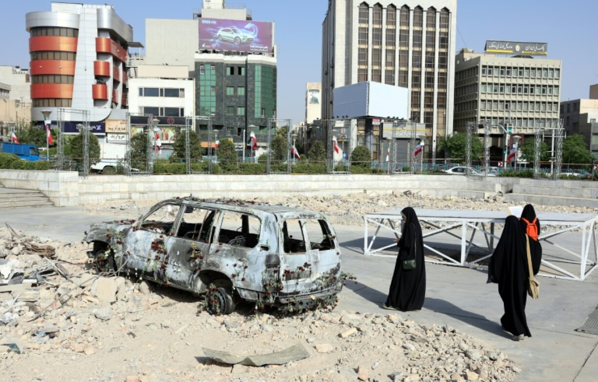 Iran said it fired missiles at a US base in Qatar, while Israeli strikes continued to pound Tehran on the war's 11th day