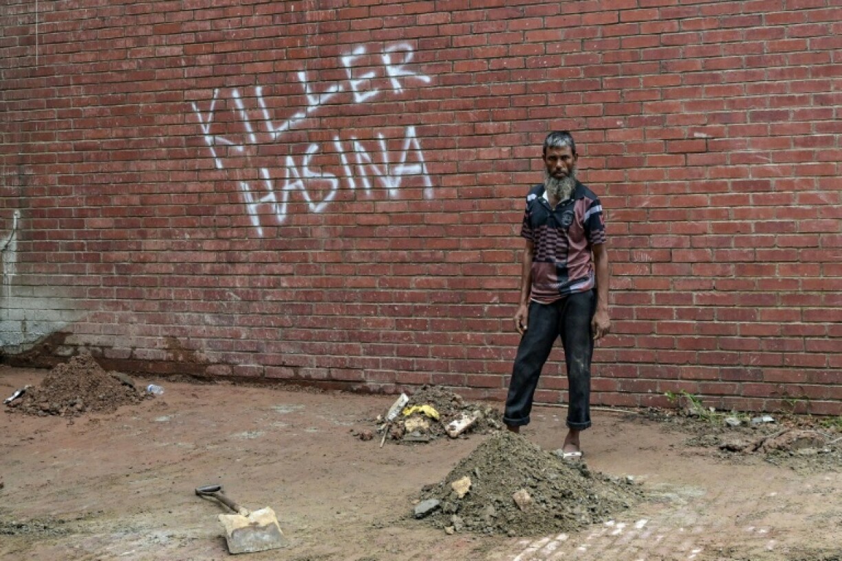 Graffiti daubed on the walls condemning Sheikh Hasina's regime remains untouched