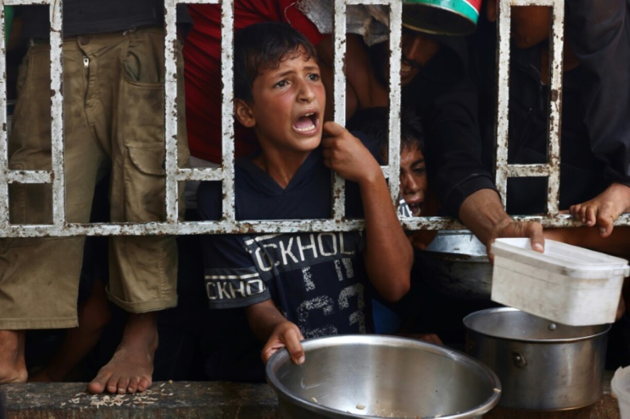 AFP journalists say the difficulties in obtaining enough food to support their families has become an unbearable burden