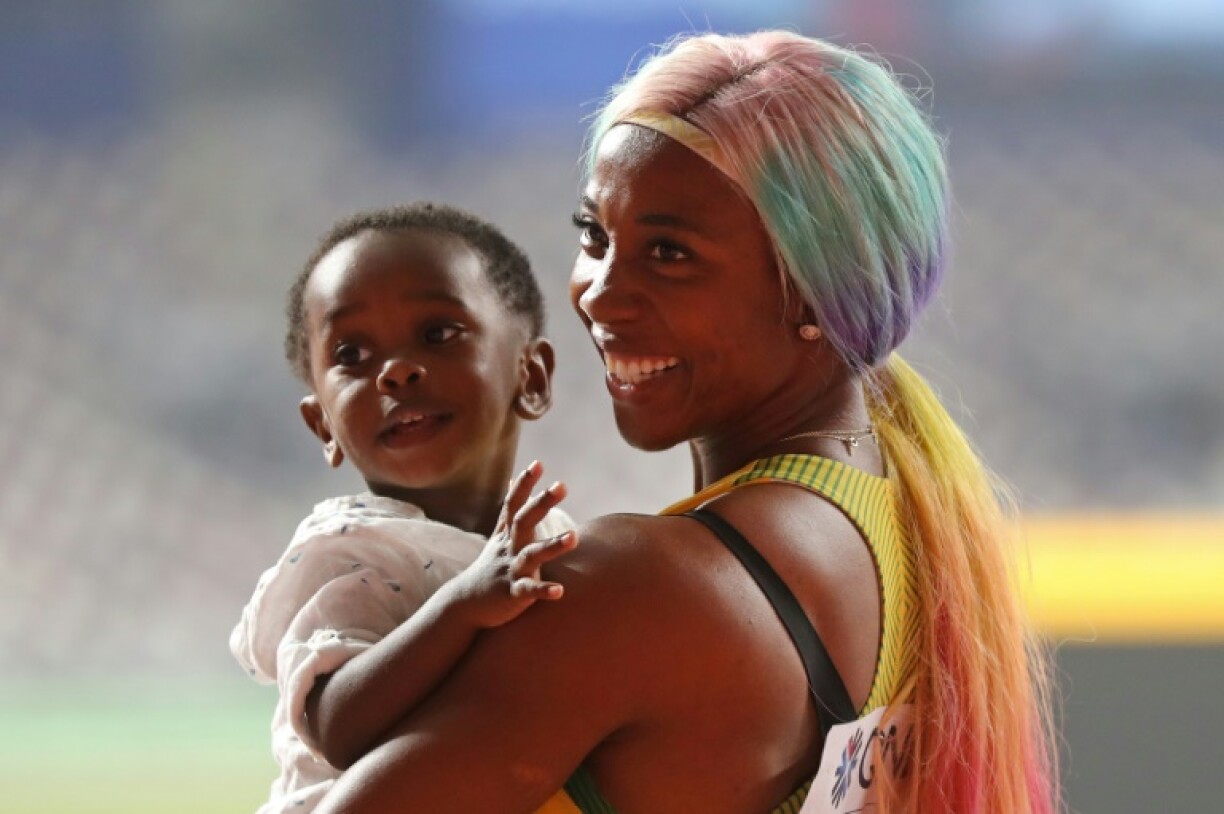 Shelly-Ann Fraser-Pryce celebrated with her son Zyon after winning the women's 100m at the 2019 world championships in Doha