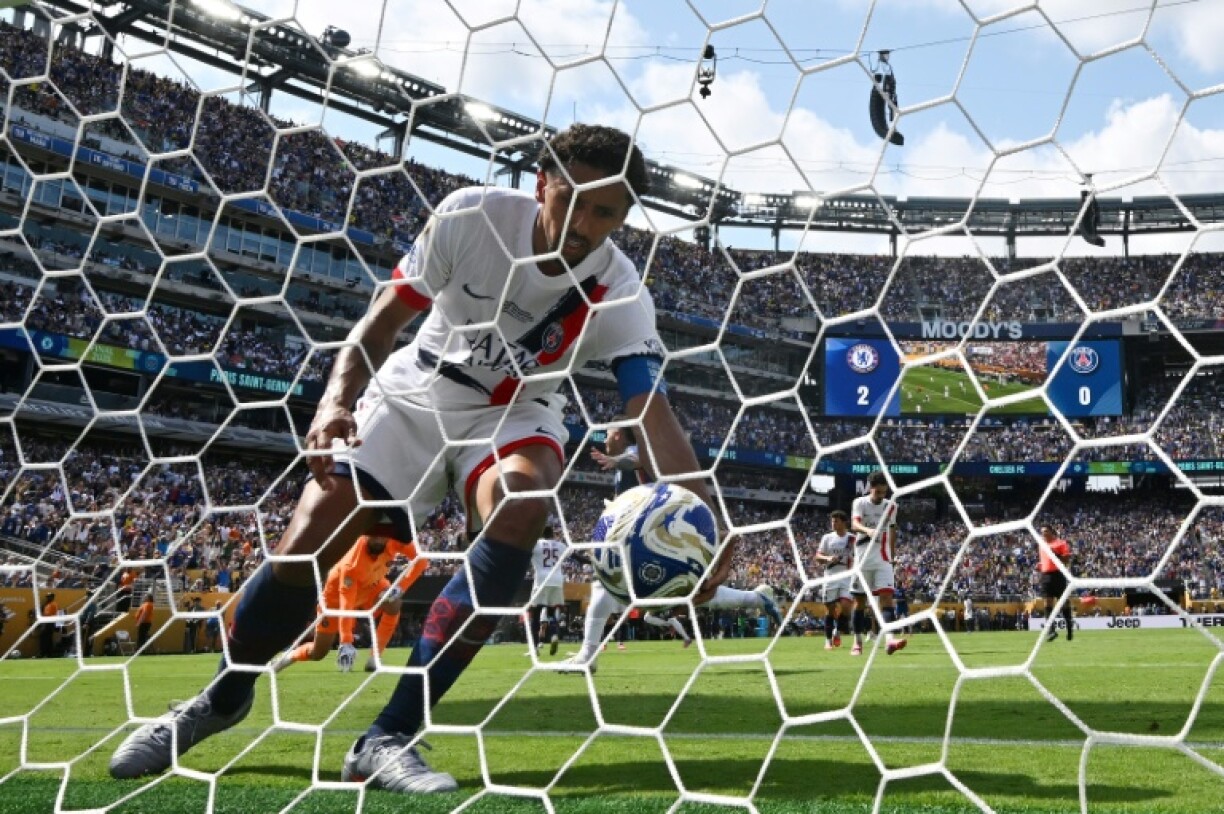 Paris Saint-Germain's Brazilian defender #05 Marquinhos picks up the ball during the FIFA Club World Cup 2025 final football match between PSG and Chelsea