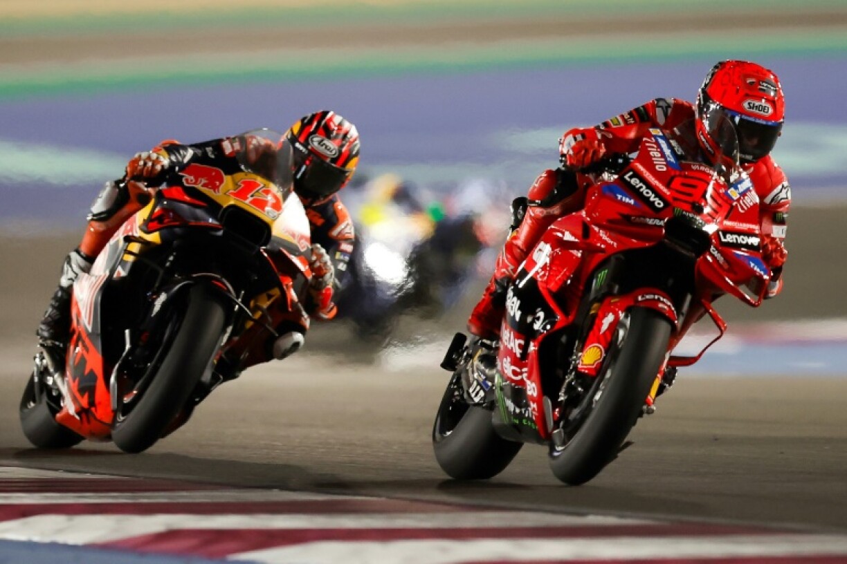 Marc Marquez leads Maverick Vinales in the closing stages of the Qatar MotoGP