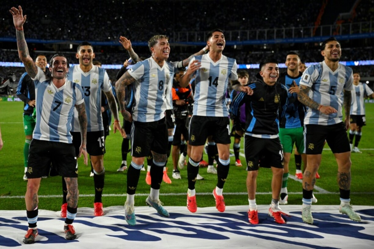 Argentina's players celebrate after thrashing Brazil 4-1 following their World Cup qualification