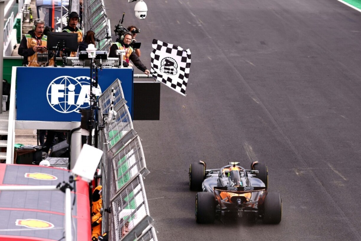 Lando Norris takes the chequered flag at Interlagos to move 24 points clear in the driver's title battle