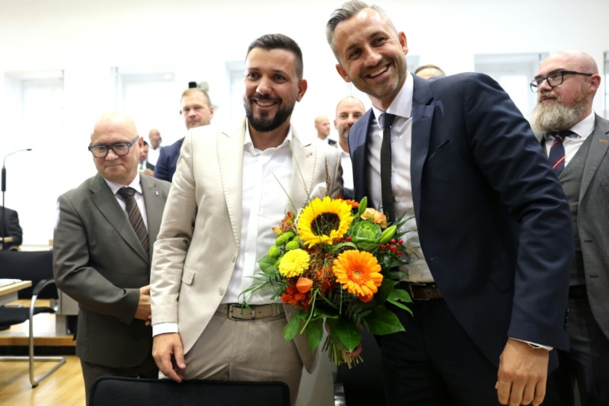 Tobias Rausch, centre, after his election as president of the state parliament in Saxony-Anhalt