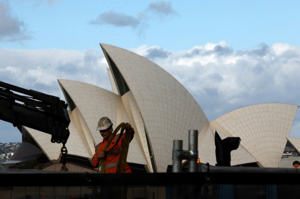 Prime Minister Anthony Albanese promised to defend Australia's interests in its trade tussle with the United States during a televised election debate with opposition leader Peter Dutton