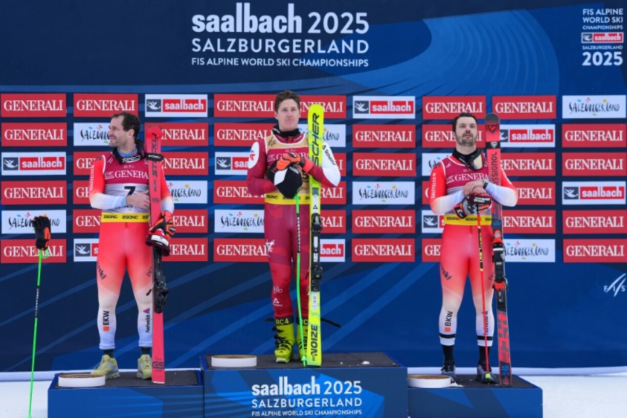 (From L) Second-placed Thomas Tumler, winner Raphael Haaser and third-placed Loic Meillard