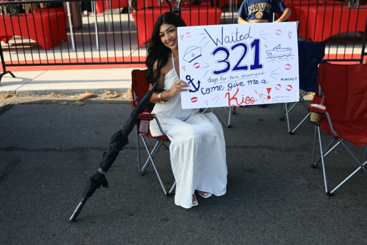 Family members lined the docks in San Diego to welcome home the USS Abraham Lincoln after its nearly year-long deployment