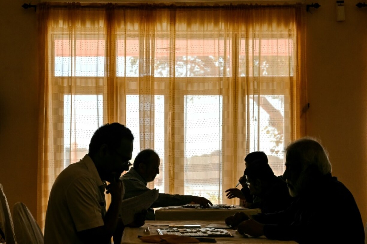 Adult participants compete in a Scrabble championship organised by the Pakistan Scrabble Association at the Beach Luxury hotel in Karachi