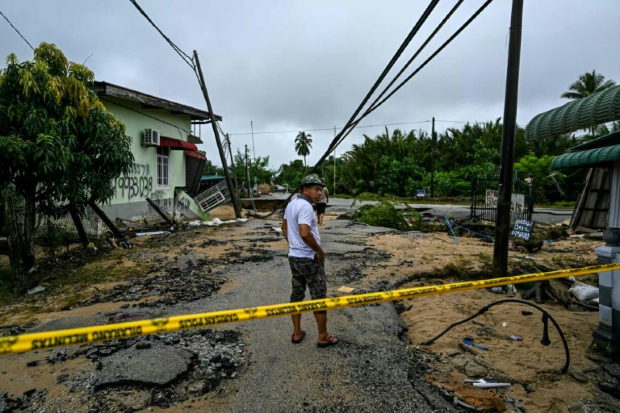 Residents are returning home in Malaysia to clear up after the floods