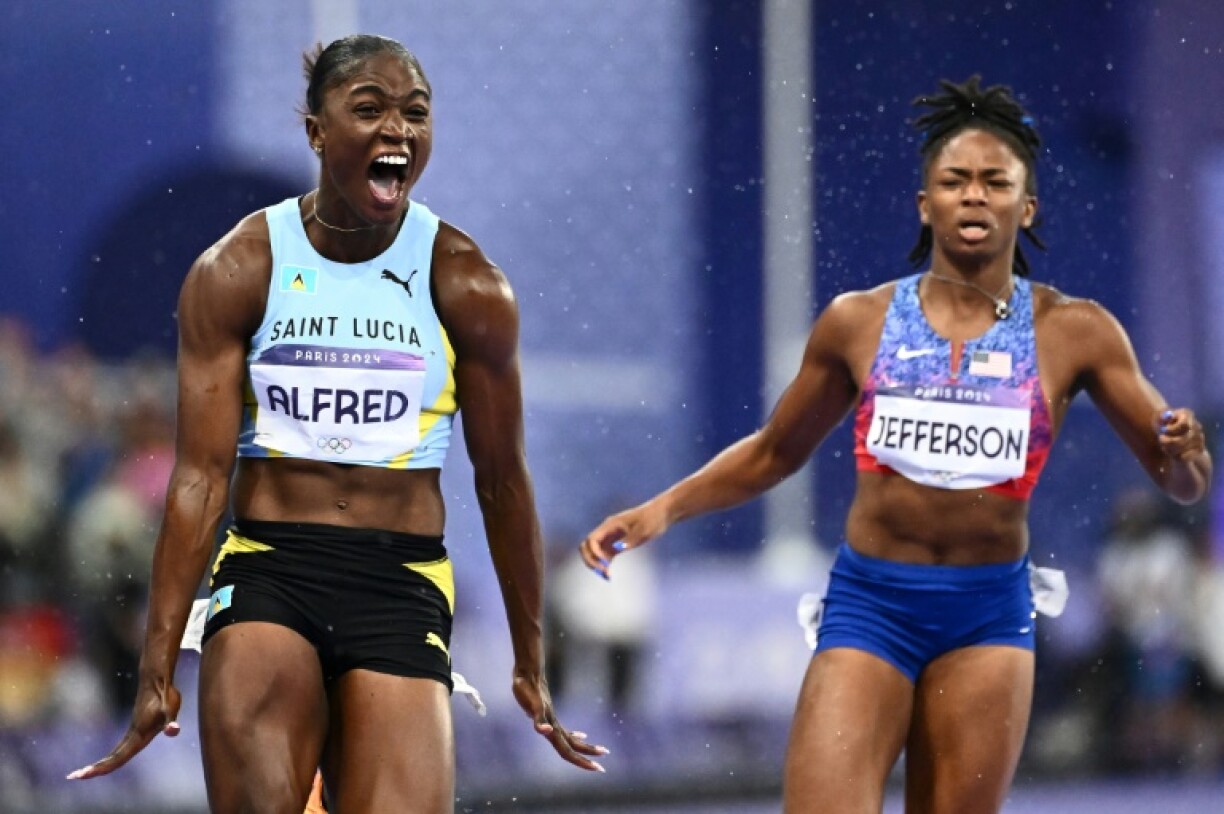 Women's Olympic 100m champion Julien Alfred (L) and men's champion Noah Lyles face strong opposition to win the world crowns in Tokyo