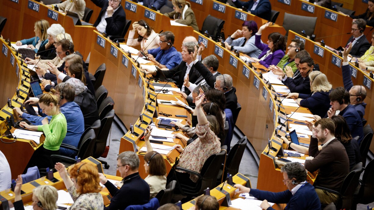 Members of the European parliament vote during a plenary mini-session at the European Parliament in Brussels on 11 April 2024.