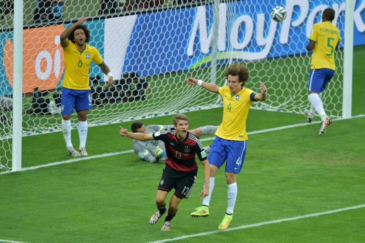 La joie de l'attaquant allemand Thomas Mueller après son but marqué contre le Brésil en demi-finale de la Coupe du monde, le 8 juillet 2014 à Belo Horizonte
