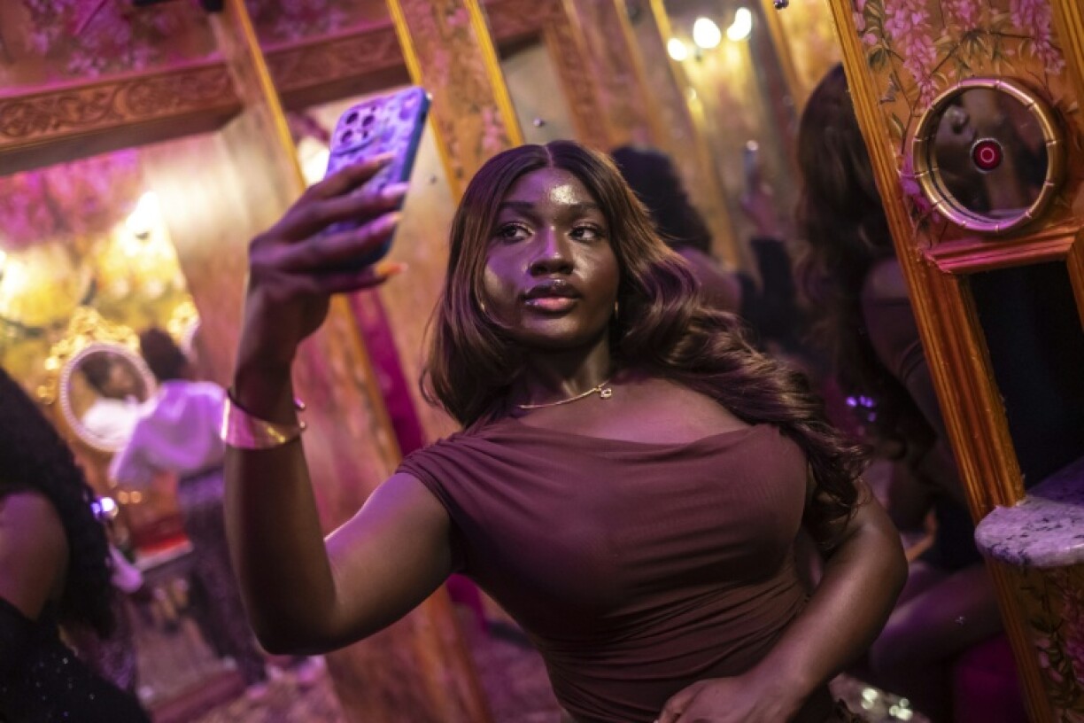 A dedicated selfie space in the women's restroom of Zaza, a restaurant and lounge in Lagos, offers patrons over-the-top decor and mirrors