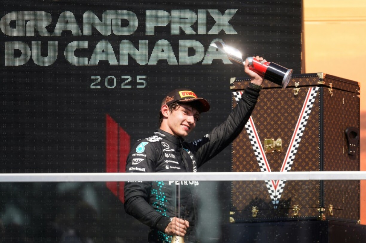 Kimi Antonelli celebrates his first career F1 podium at the age of just 18