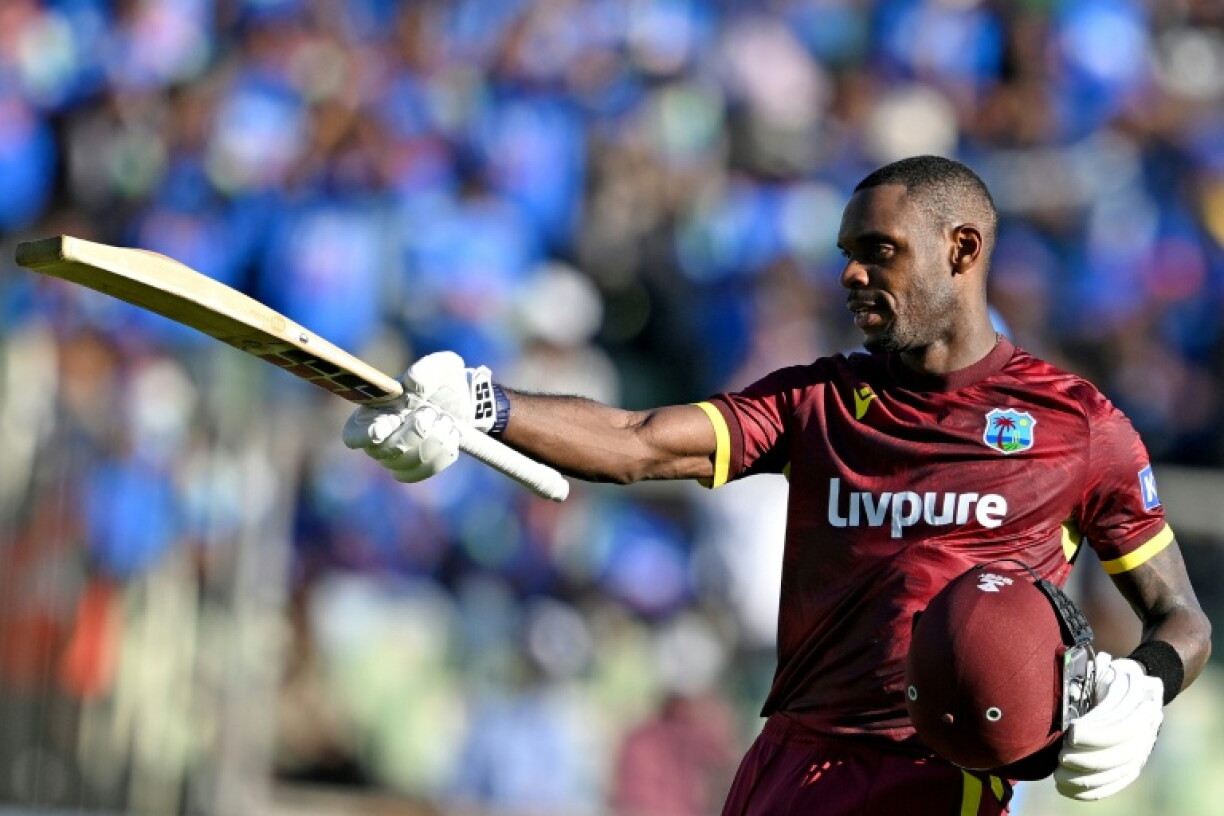 West Indies' Justin Greaves celebrates after scoring a century (100 runs) during the first one-day international (ODI) cricket match between India and West Indies at the Greenfield International Stadium in Thiruvananthapuram on September 27, 2026.