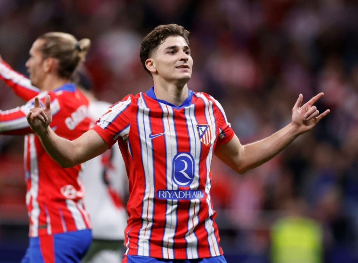 Atletico Madrid's Argentine forward Julian Alvarez celebrates scoring his team's third goal