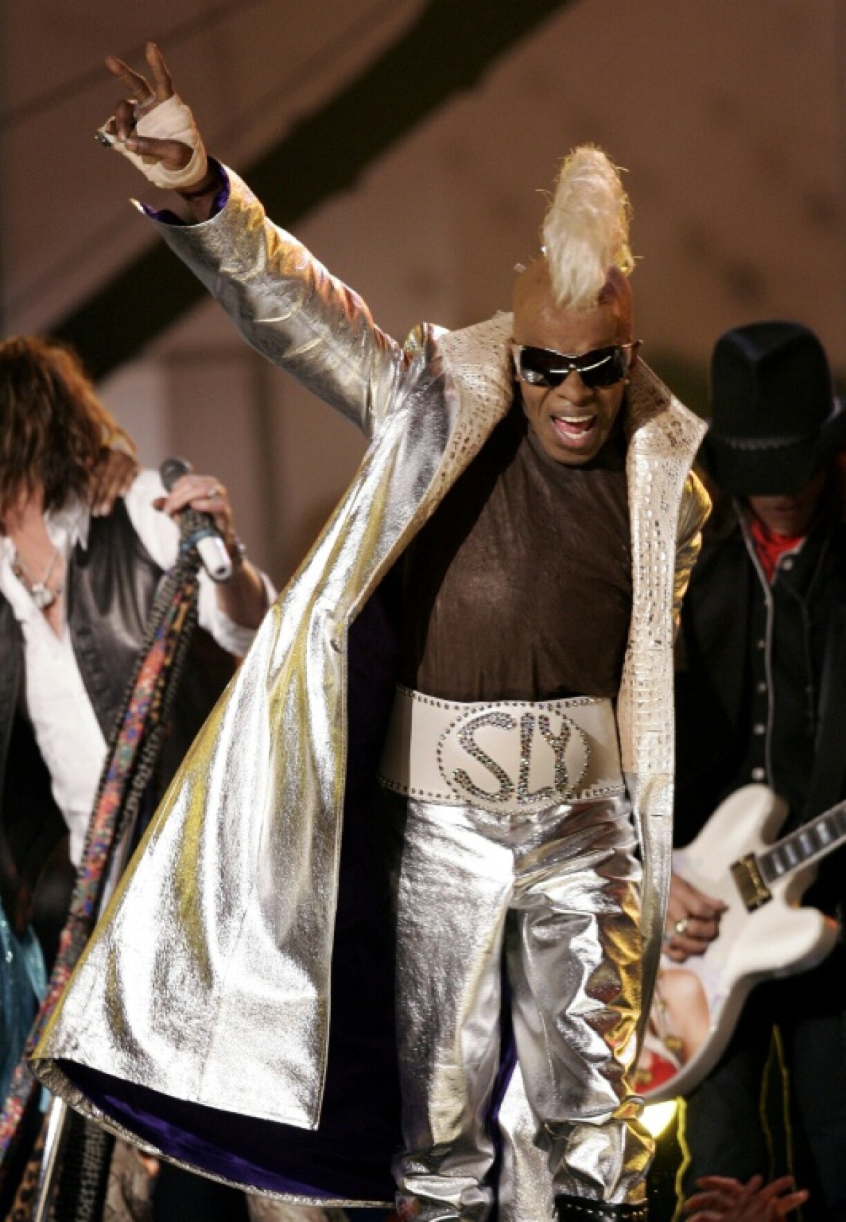 US musician Sly Stone appears during a Sly and the Family Stone tribute during the Grammy Awards ceremony on February 8, 2006 in Los Angeles