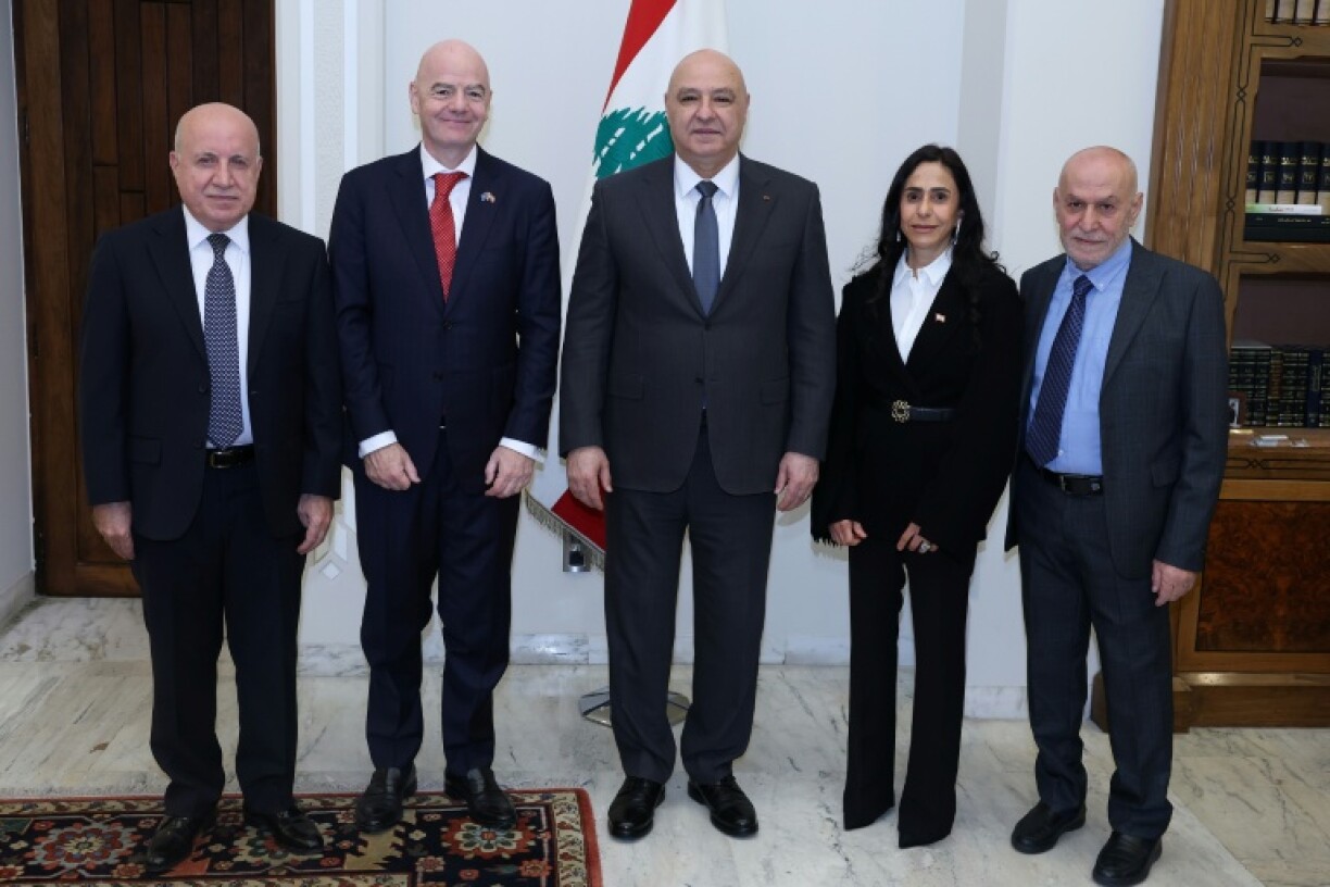 A handout photograph released by the Lebanese Presidency's press office on November 25, 2025, shows from L-R: Head of the Lebanese Football Association Hashem Haidar, FIFA President Gianni Infantino, Lebanese President Joseph Aoun, Leena al-Ashqar, the wife of Gianni Infantino, and Secretary-General of the Lebanese Football Federation Jihad Al-Shahaf