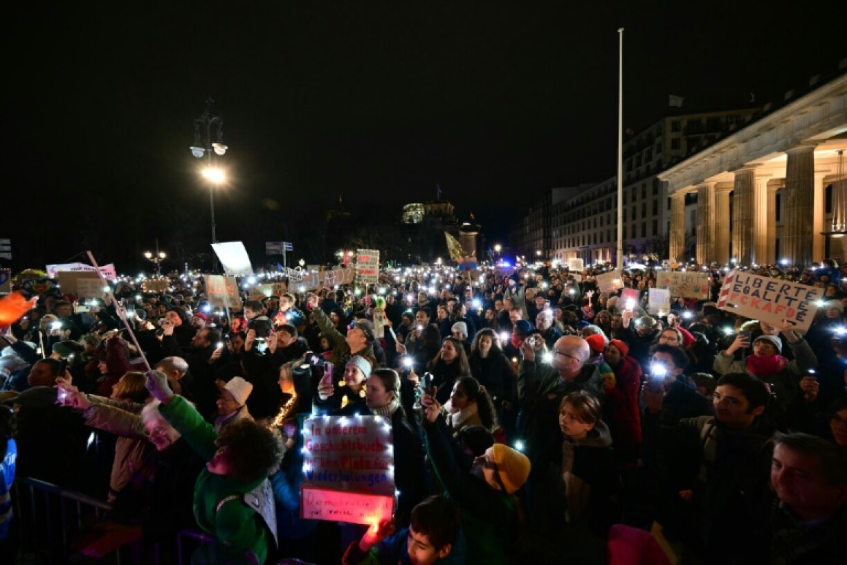 Anti-AfD protestors in Berlin created a 'Sea of Lights for Democracy' in front of the Brandenburg Gate