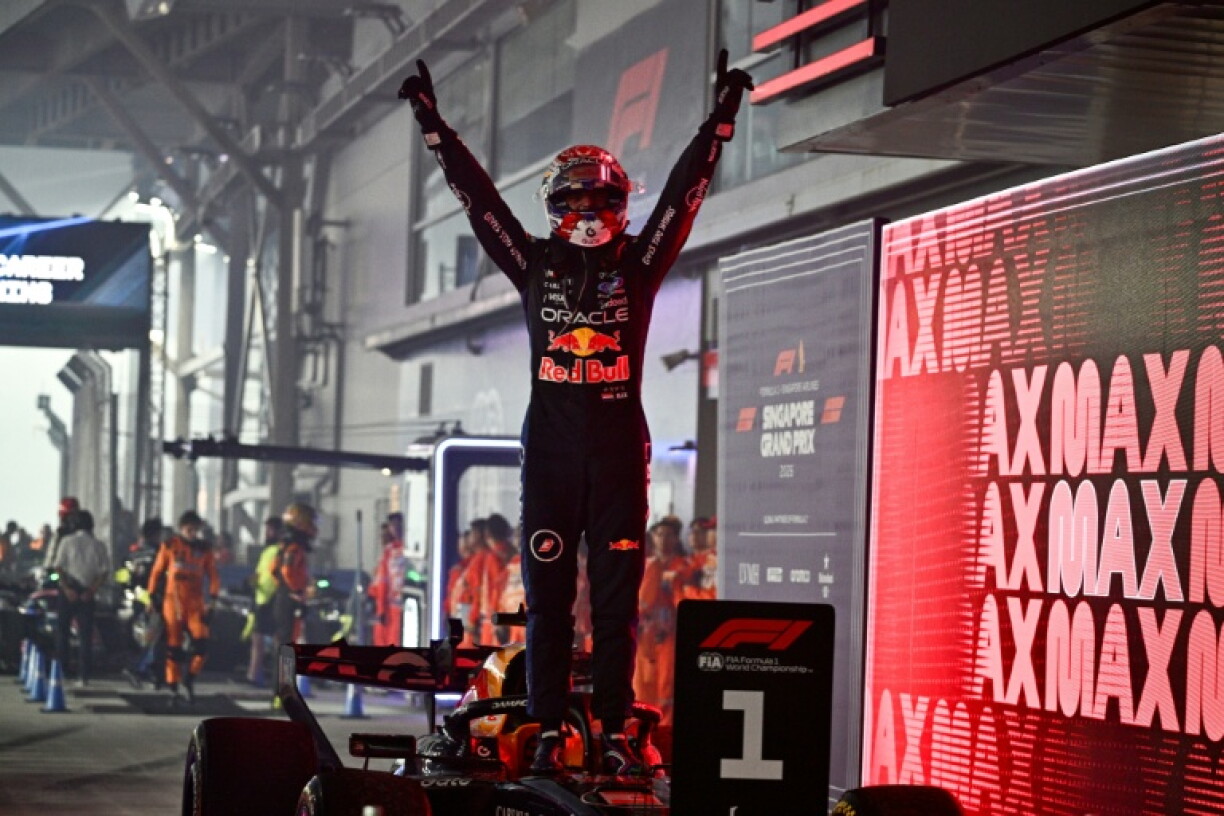 Max Verstappen celebrates winning the Formula One Singapore Grand Prix