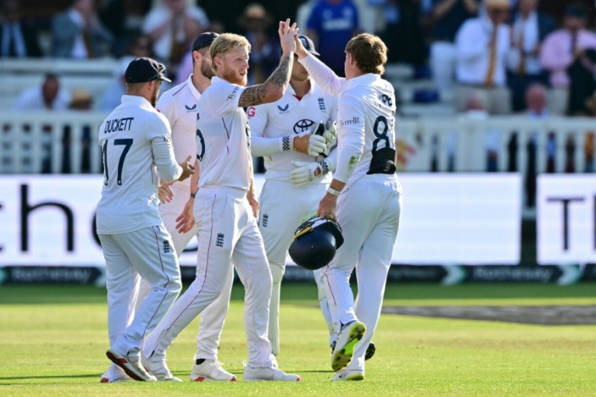 England captain Ben Stokes (C) celebrates with team-mates after dismissing nightwatchman Akash Deep in the third Test against India at Lord's
