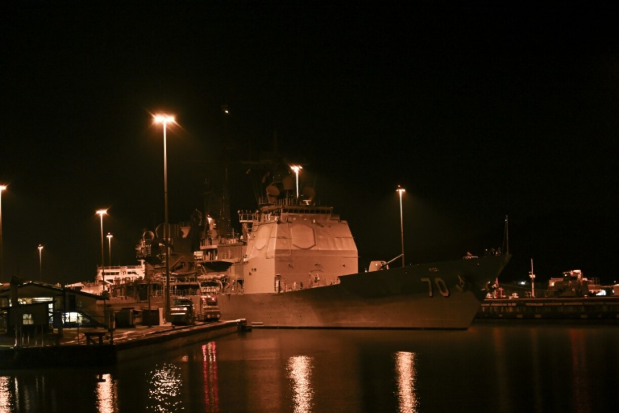 The US Navy warship USS Lake Erie (CG 70) crosses the Pedro Miguel Locks of the Panama Canal