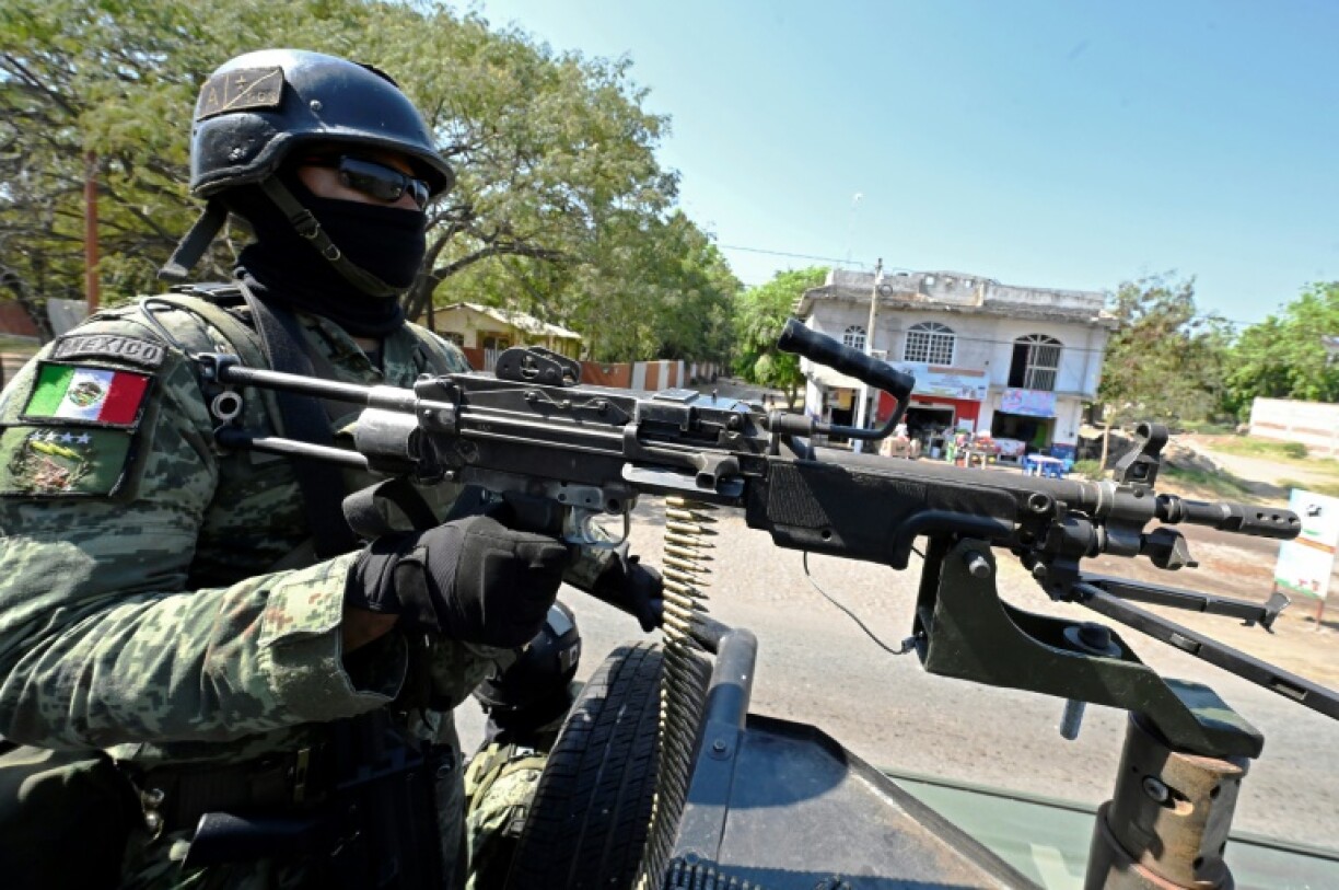 Mexican soldiers patrol the western state of Michoacan, a battleground for rival drug cartels