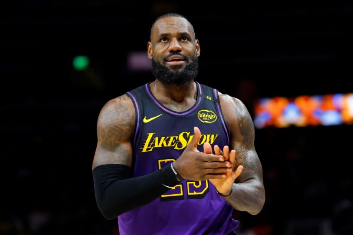 LeBron James produced a triple double with 39 points but his Los Angeles Lakers were beaten in overtime by the Atlanta Hawks.