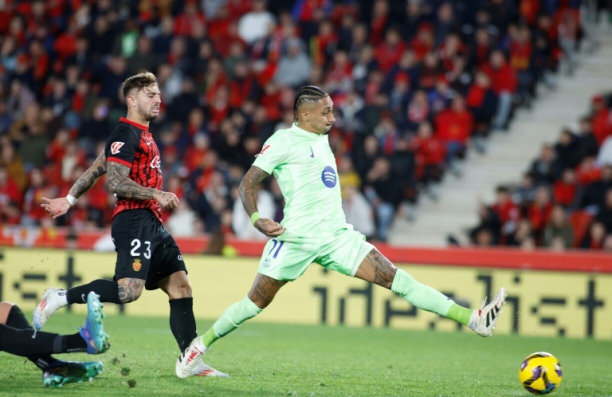 Raphinha scoring Barcelona's third goal during their win at Mallorca