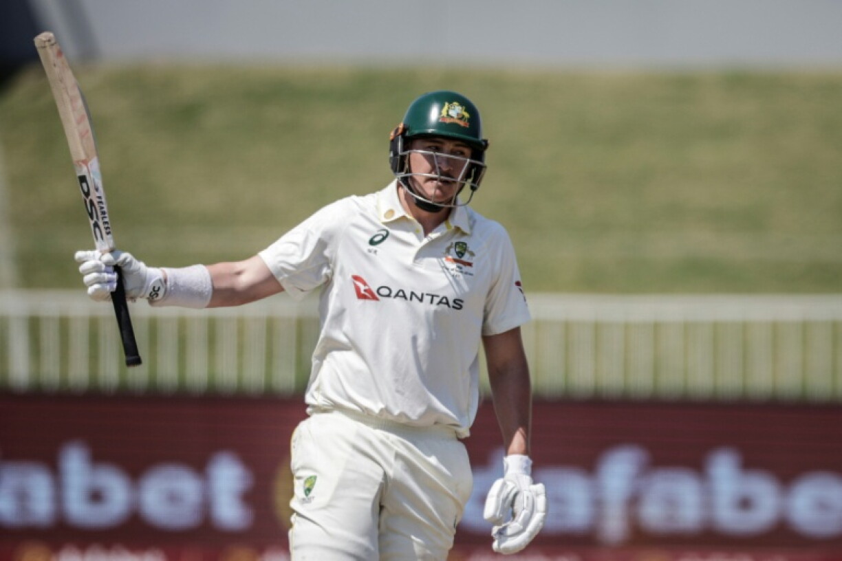Australia's Matt Renshaw celebrates after scoring a half-century in the second innings against South Africa