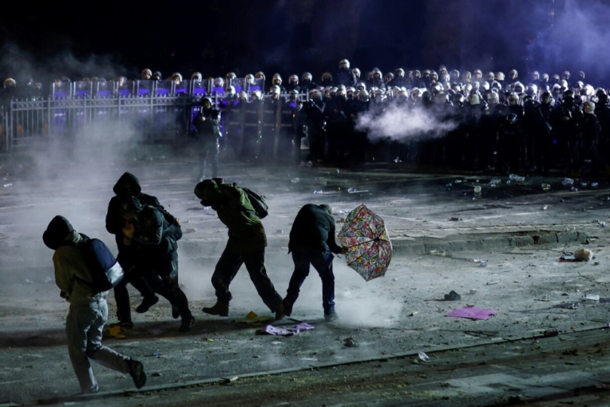 Riot police have fought running battles with protesters since Thursday night