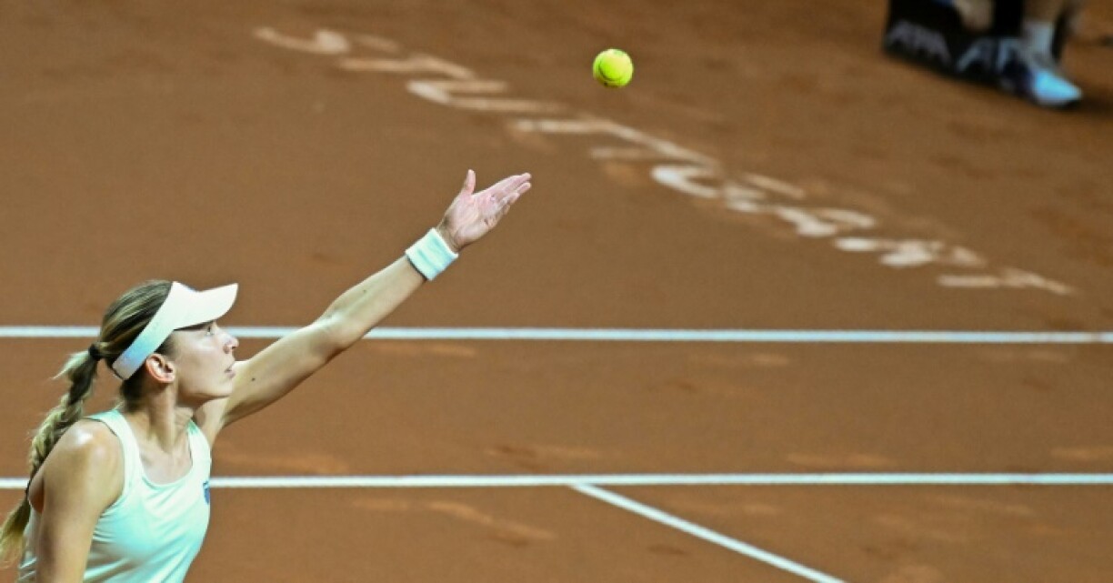 Ekaterina Alexandrova preparing to serve as she beat Mirra Andreeva in Stuttgart
