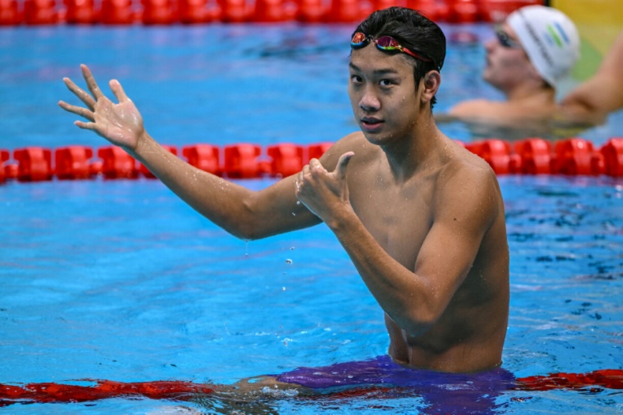 Gold medallist China's Zhang Zhanshuo celebrates