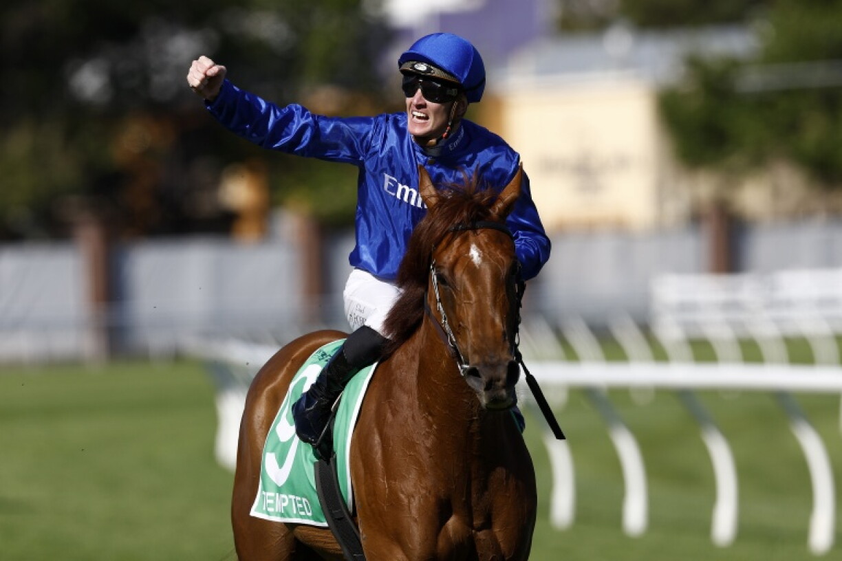 Jockey Chad Schofield, rider of Tempted, celebrates winning the Everest 2026 race at the Royal Randwick racecourse in Sydney on October 17, 2026
