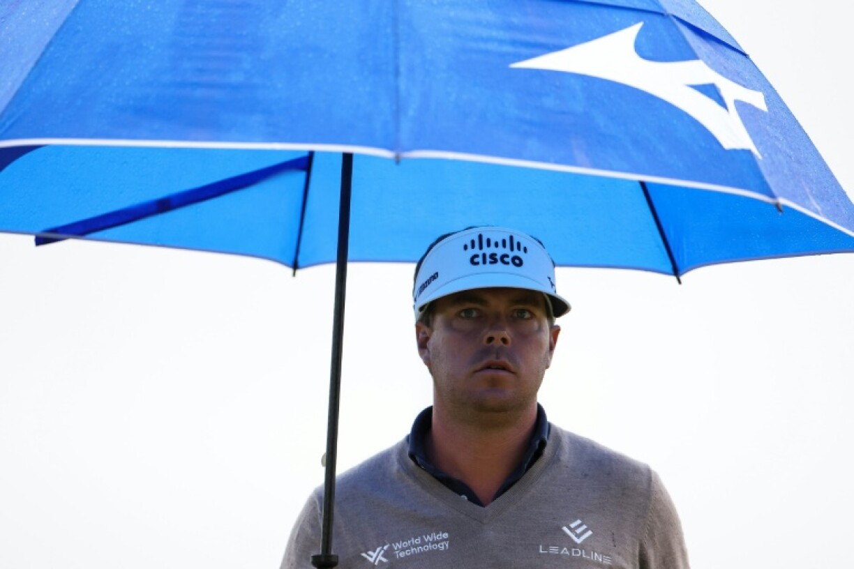 American Keith Mitchell fired a 67 in rainy conditions to keep the lead after the second round of the PGA Truist Championship