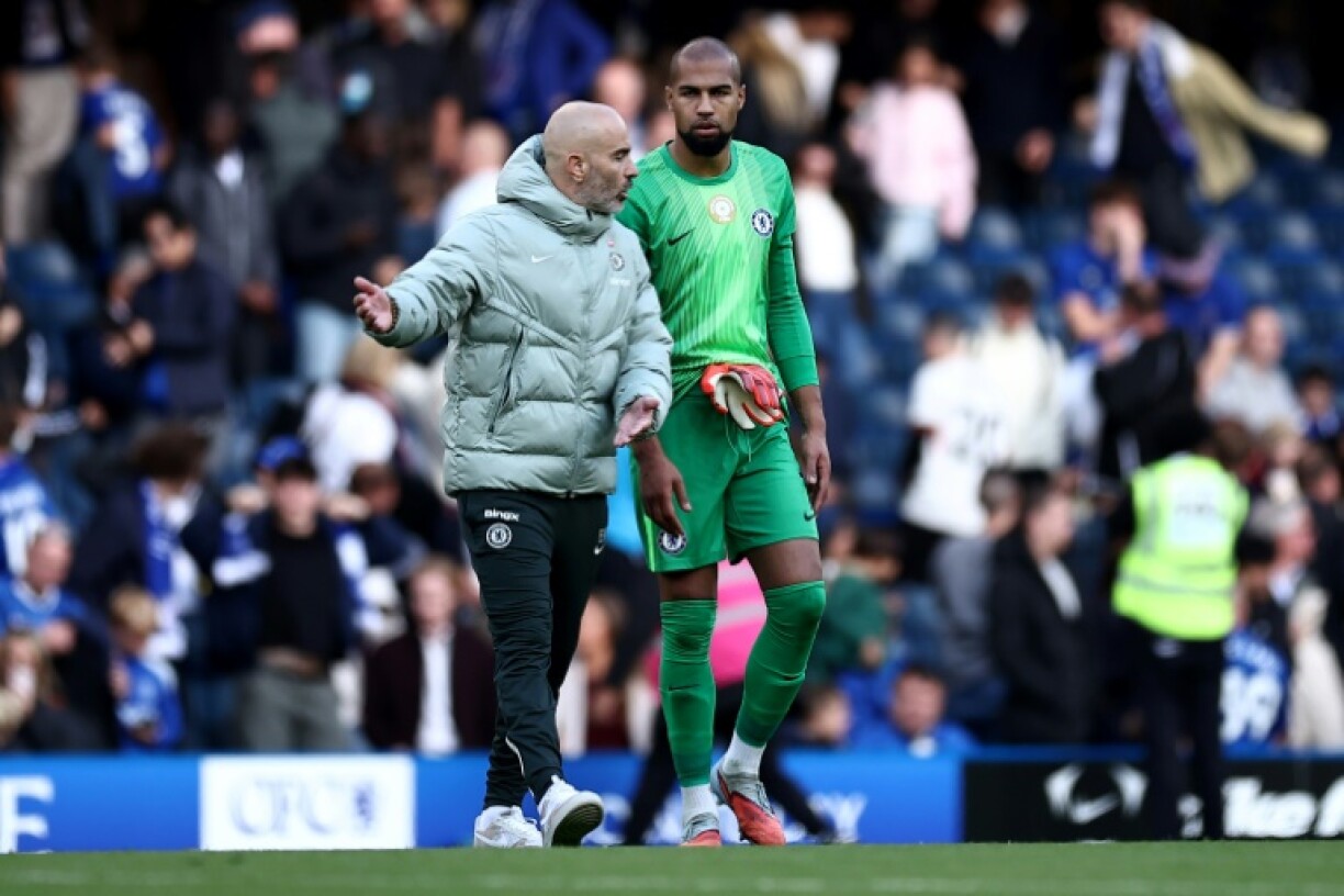 Chelsea boss Enzo Maresca (L) after the loss to Brighton