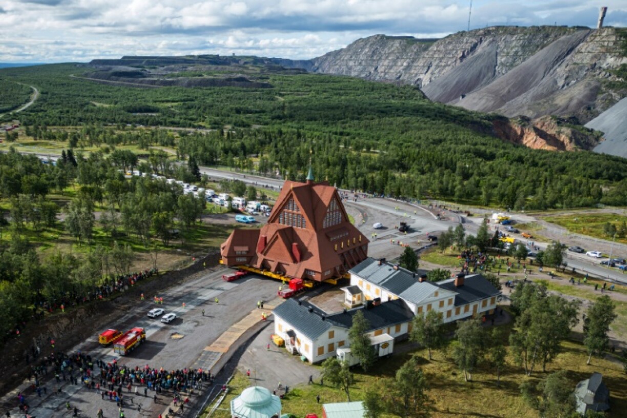 Kiruna Kyrka, an imposing 672-tonne Swedish Lutheran church from 1912, is being moved five kilometres (three miles) on remote-controlled flatbed trailers