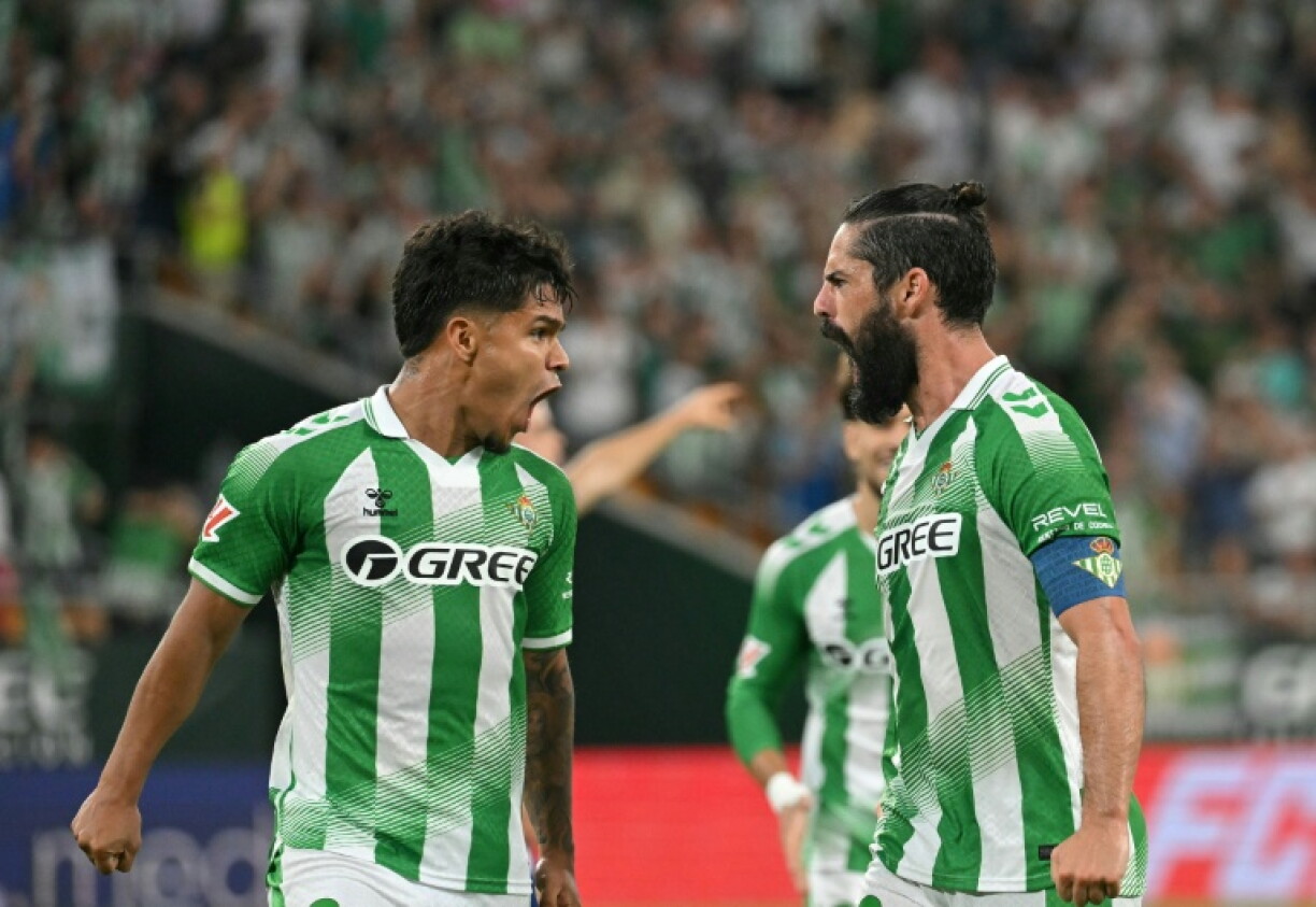Real Betis midfielder Isco scored twice as his side crushed Osasuna to go back third in La Liga