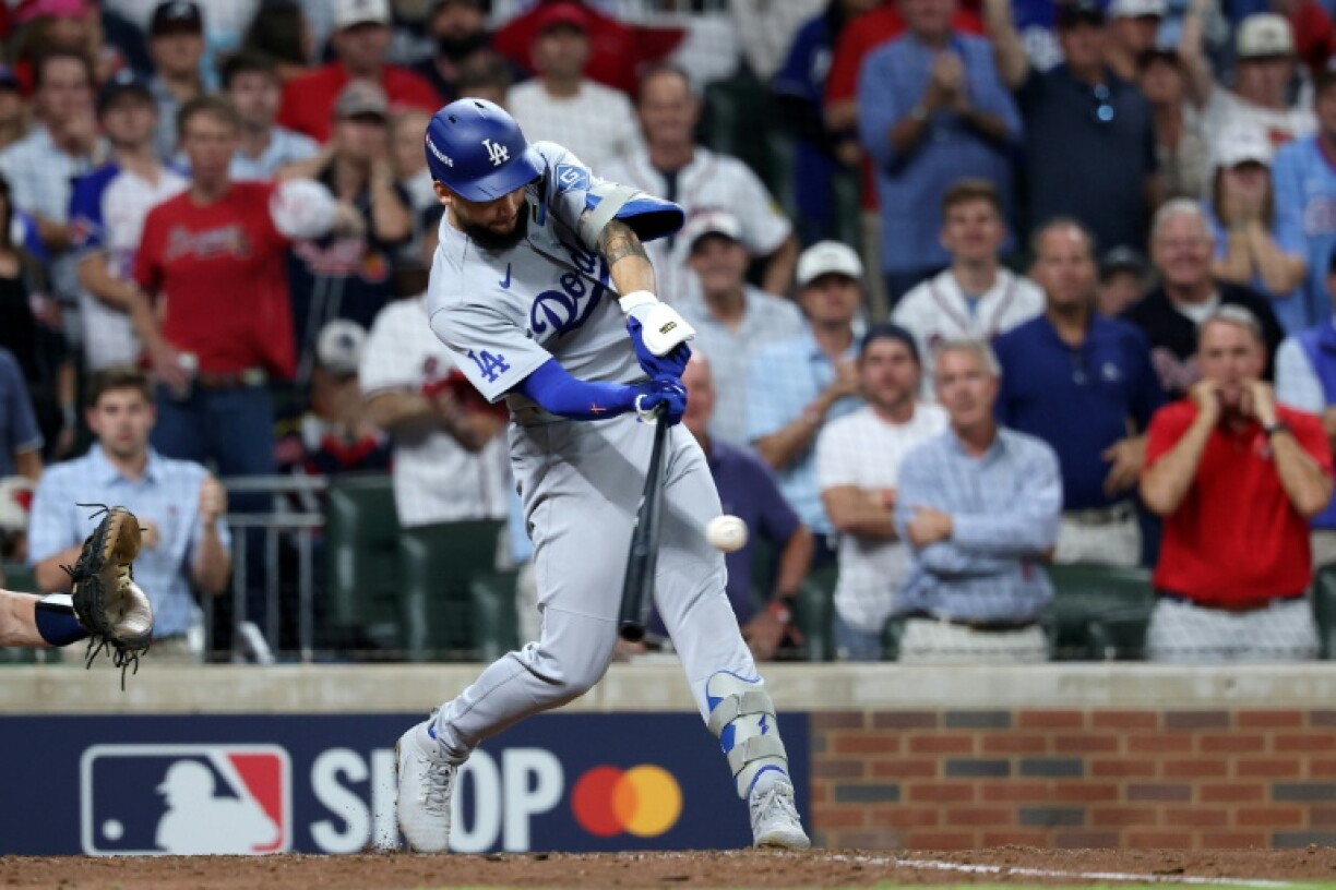 Andy Pages of the Los Angeles Dodgers hits a two-run single in a victory over the Atlanta Braves that saw the World Series champion Dodgers advance in the MLB playoffs
