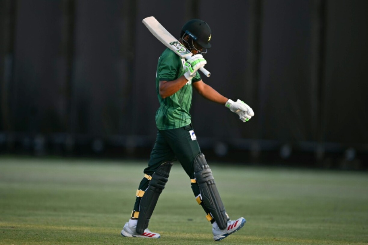 Pakistan's Hasan Nawaz walks off the field following his dismissal for 96