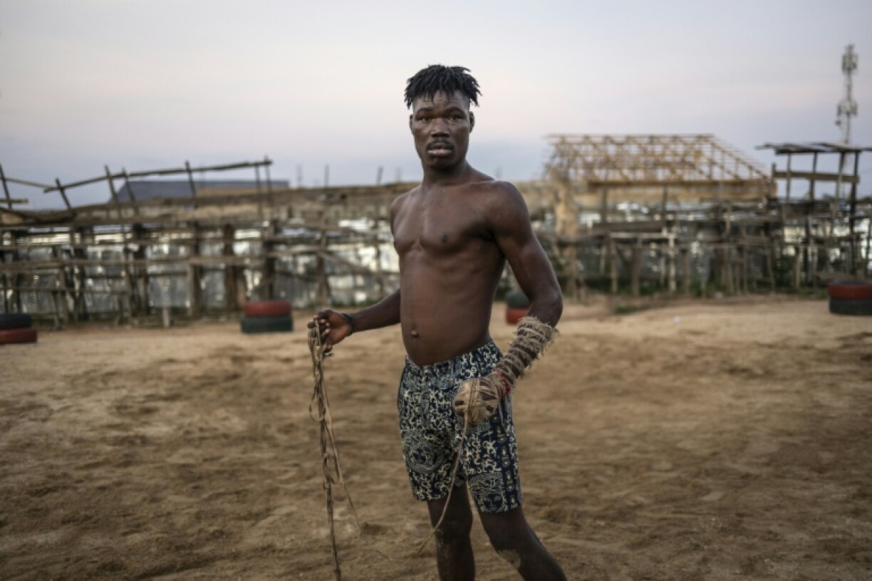 Dambe figthers are clad in charms and amulets to protect them in the ring