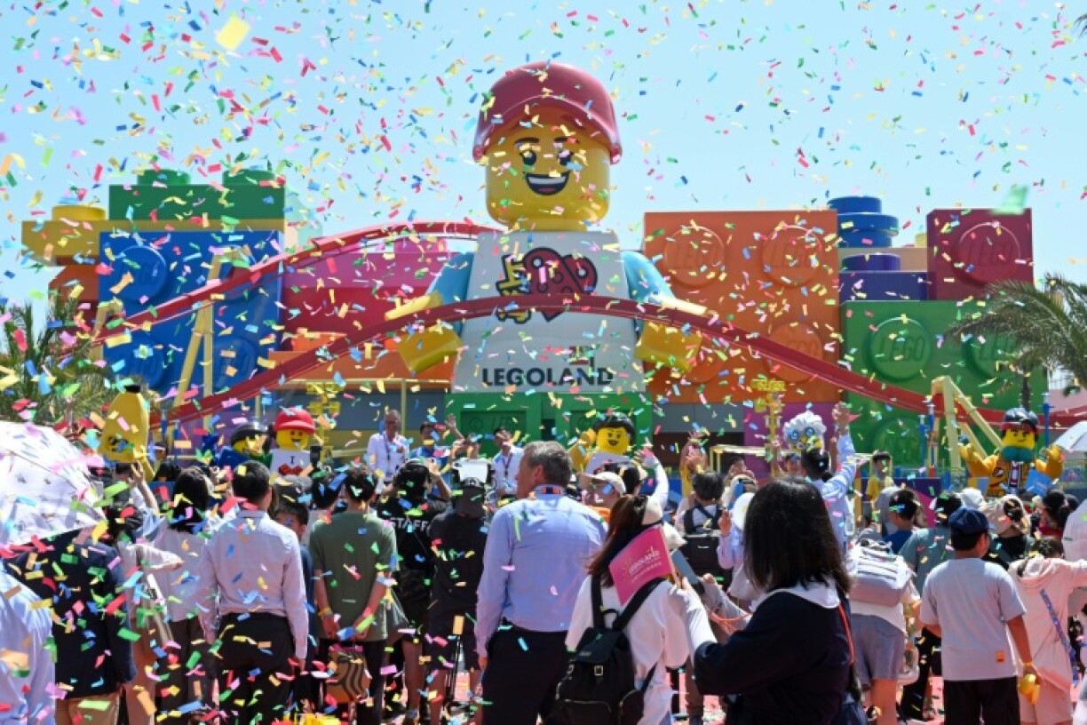 People attend the grand opening ceremony of the Legoland Shanghai Resort, the world's largest Legoland theme park