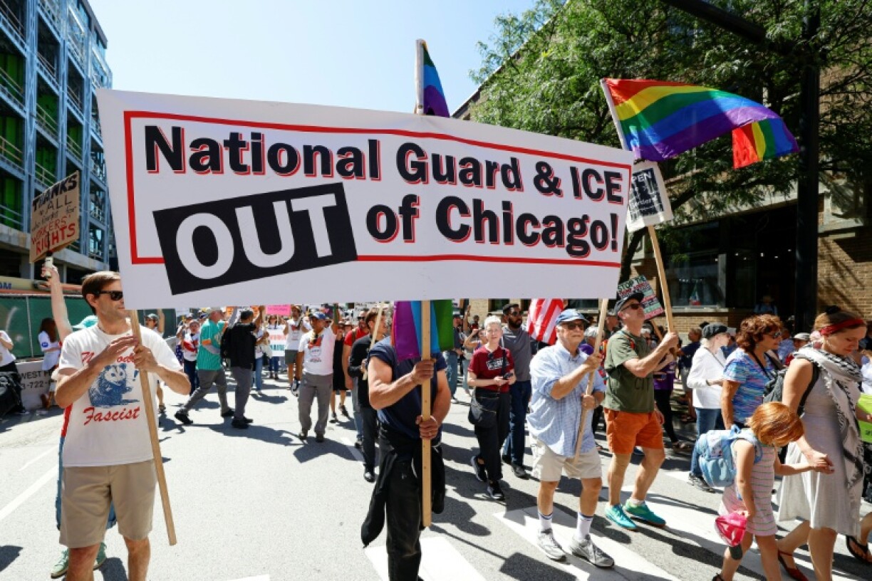 Protesters opposed to federal troop deployments in Chicago march in the city