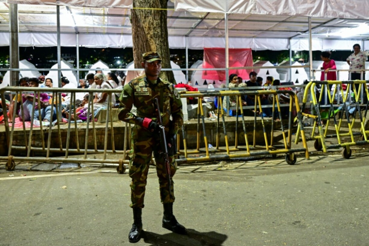 Police and soldiers have deployed to safeguard Sri-Lanka's Temple of the Tooth