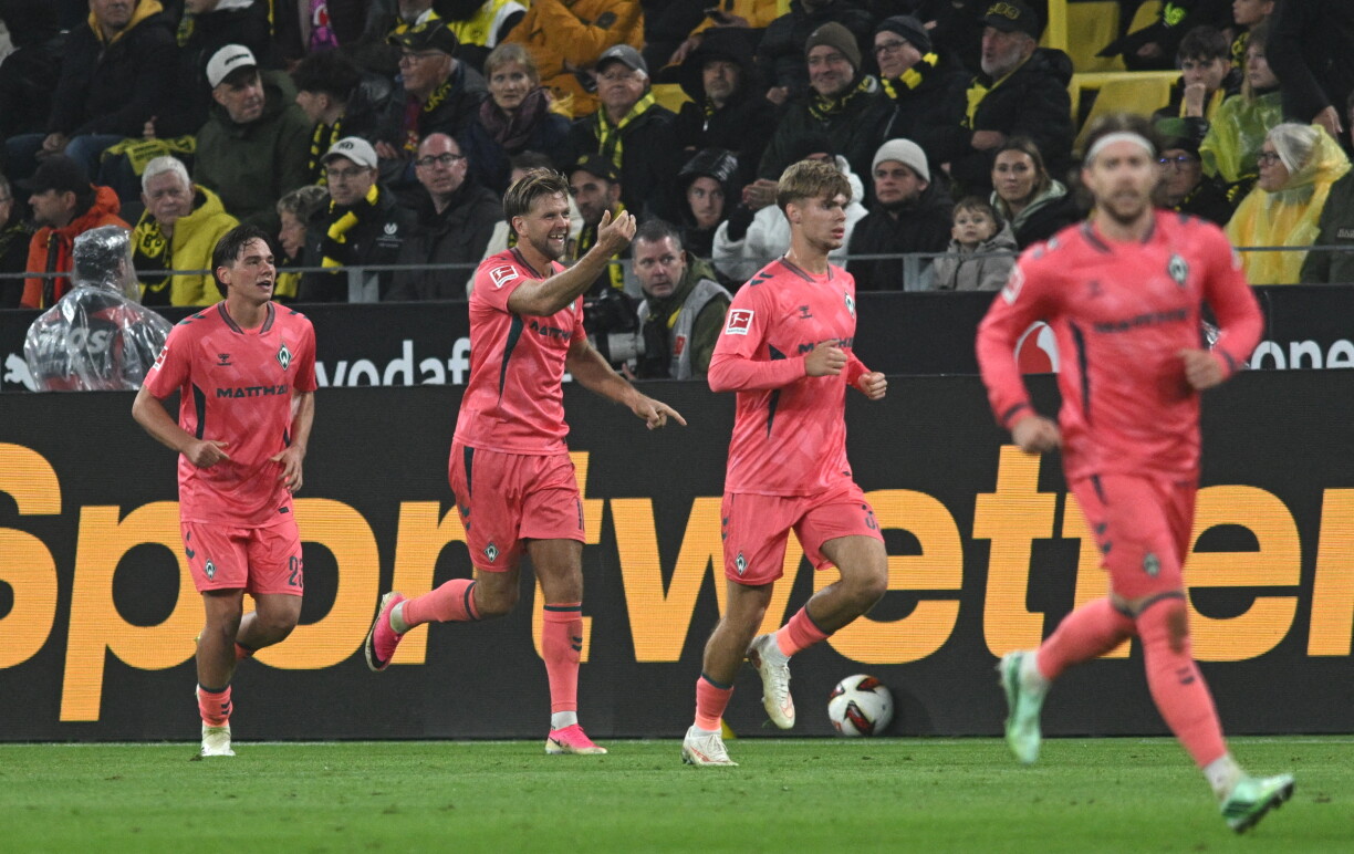 Mat zwee ganz spéide Goler konnt Bremen ee Punkt zu Dortmund mathuelen.